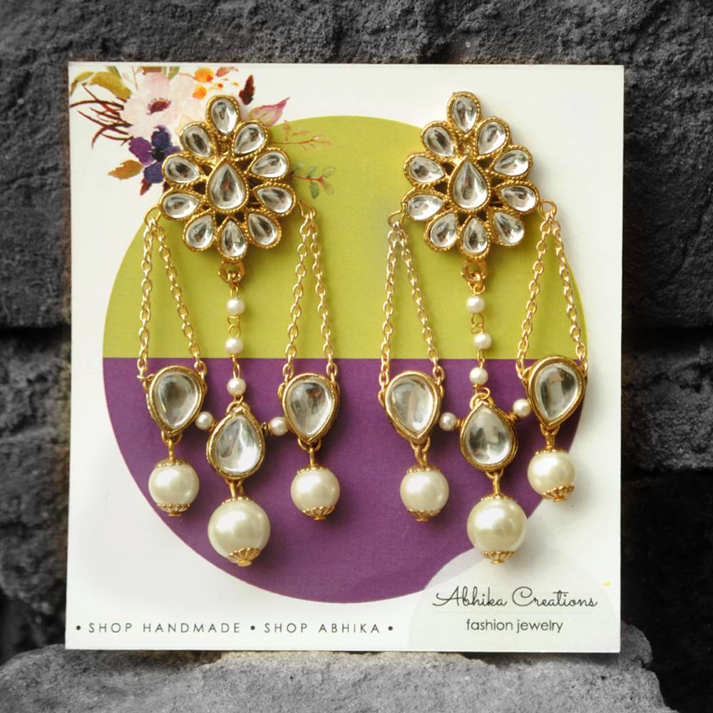 Kundan Dangling Interlinked Pear Earrings